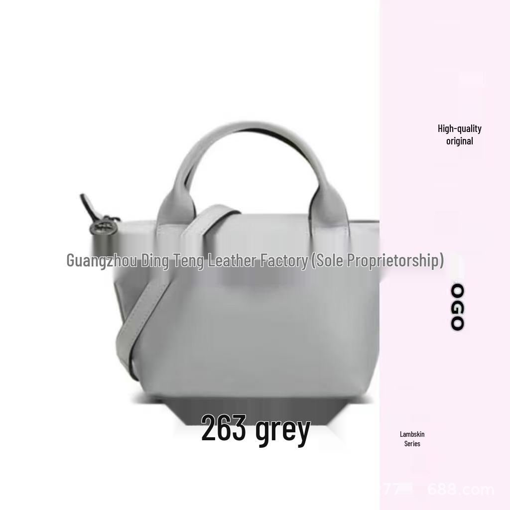 Hochwertige Mini-Knödeltasche aus Nappaleder mit Drachenprägung, Vielseitig für den Weg zur Arbeit, zum Tragen in der Hand, über der Schulter, mit verstellbarem Crossbody-Riemen.
