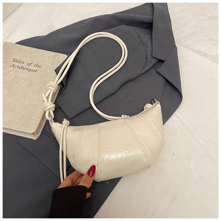 

Нишевая сумка-круассан женская новая популярная модная на плечо подмышку универсальная сумка-мессенджер для поездок на работу