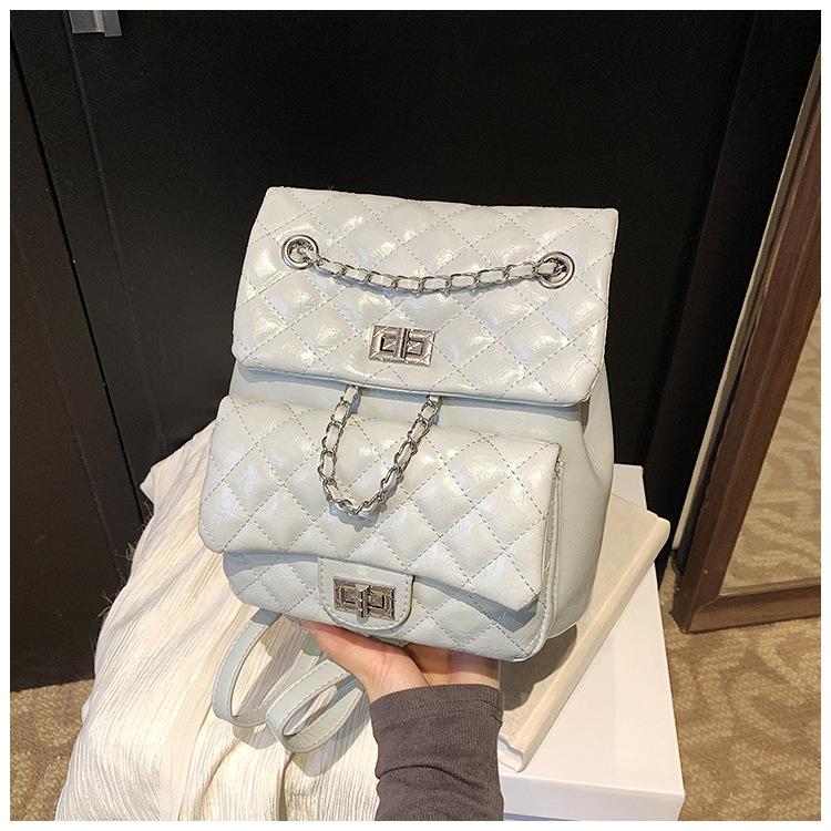 

2025 новый рюкзак женский дизайн чувство мода цепочка для выхода маленький рюкзак ромб женская сумка серый