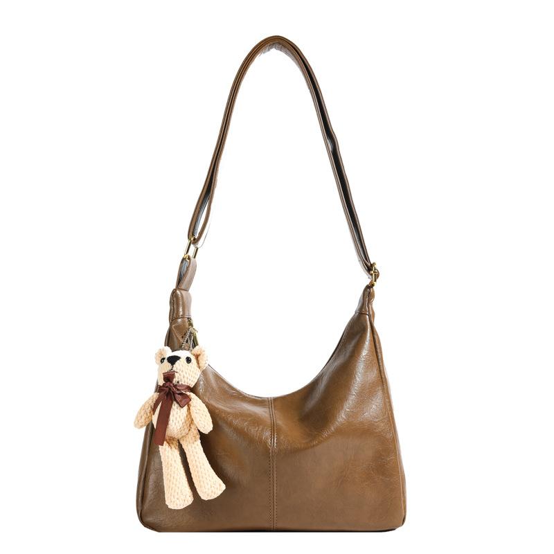 

Ленивый ветер нишевая сумка-пельмень женская осенне-зимняя ретро текстура сумка-тоут для通勤 персонализированная мягкая кожаная наплечная сумка-мессенджер with pendant