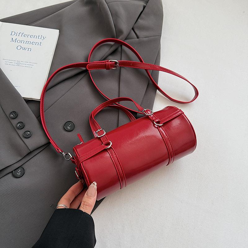 Mode handgedragen bowlingtas dames herfst nieuw eenvoudig niche trend forens schouder messenger dames tas