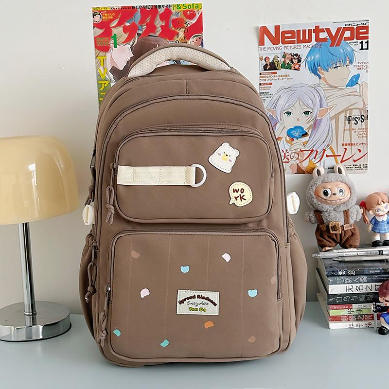 

Новый высококачественный, свежий и сладкий рюкзак конфетных цветов, легкий и вместительный рюкзак для учеников средней школы коричневый