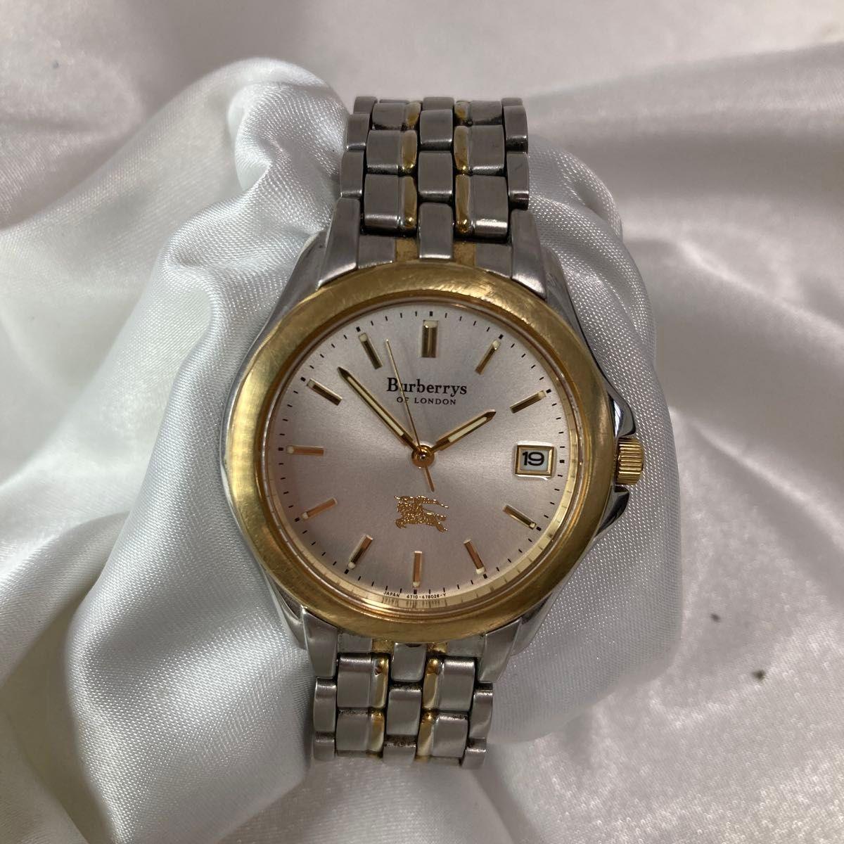 Used Burberrys Burberry watch with date unisex battery dead