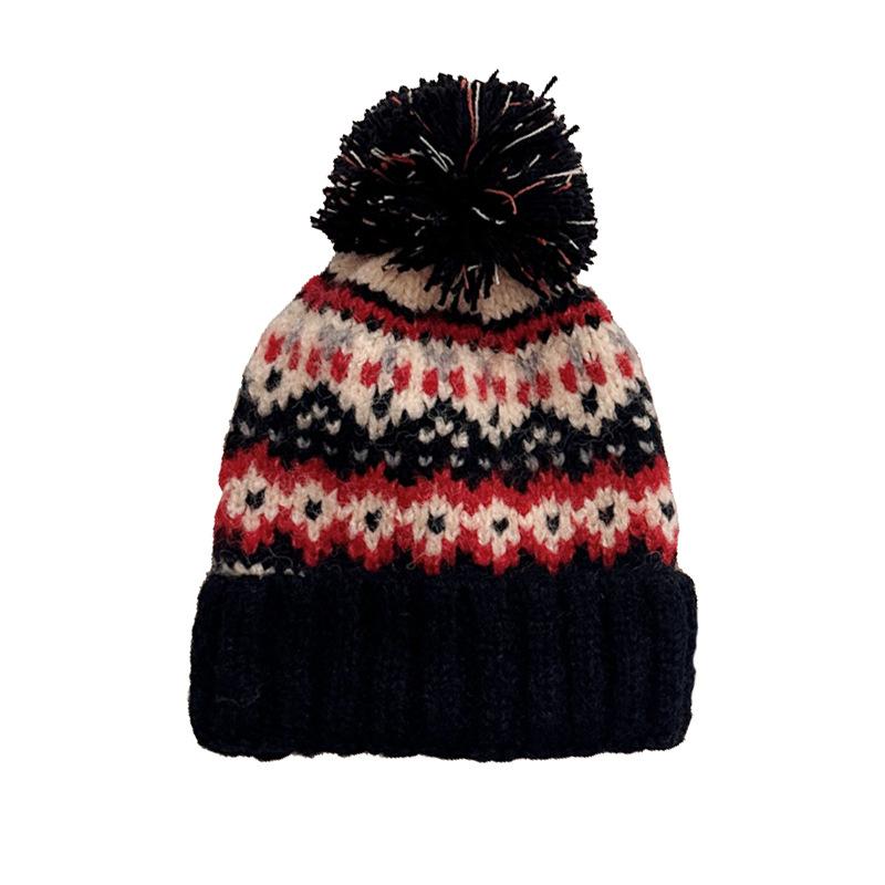 Winter new jacquard contrasting wool hat women's thickened warm windproof hat pullover hat cute hairball knitted hat