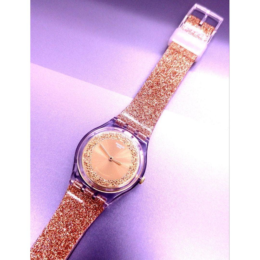 Used Swatch watch (gold)