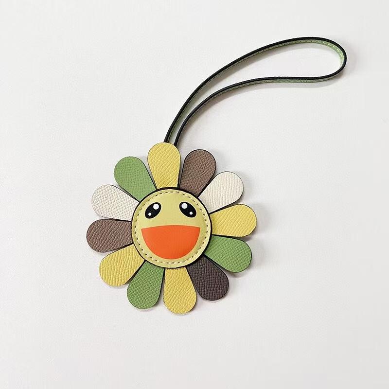 Colorful smiley face flower rainbow sunflower pendant fashion contrasting color leather platinum bag pendant accessories