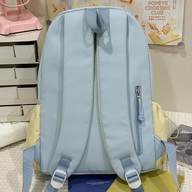School bag female ins wind Korean version backpack contrasting colors Harajuku college wind campus junior high school students backpacking trip