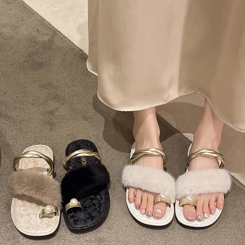 Französische Nischen-High-End-Slipper mit flachem Boden für Damen-Oberbekleidung 2025 Sommer neue Mode lässig Zehen bedeckende Strandsandalen