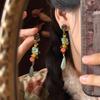 Imitation jade flower fringed earrings fashion light luxury antique stud earrings personality niche high sense earrings women