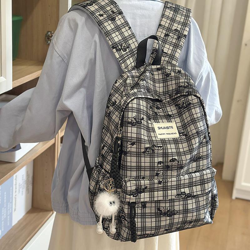 New high-value Japanese schoolbag ins niche backpack girl college student versatile junior high school floral backpack