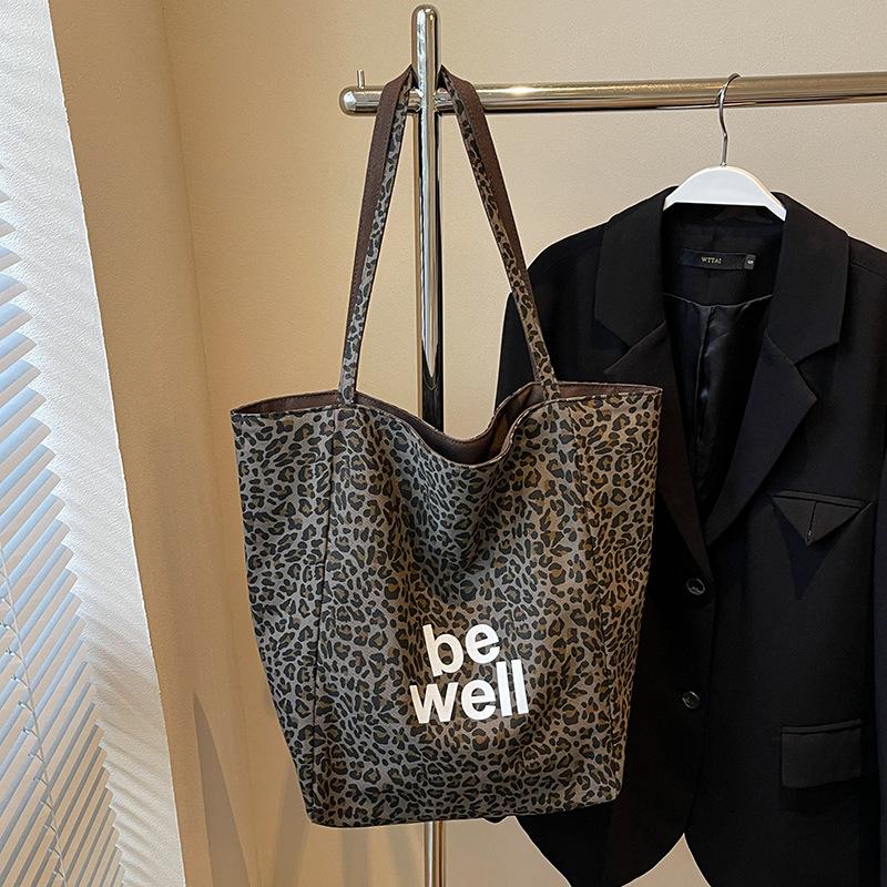 

Ретро холщовая сумка с леопардовым принтом, сумка для покупок, сумка-тоут, женская, 2025 новинка, повседневная холщовая сумка, портативная студенческая тканевая сумка