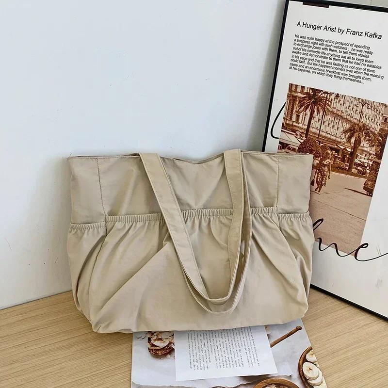 Lässige einfache vielseitige gewaschene Stoff-Schultertaschen einfarbig Reißverschluss weich große Kapazität geraffte Taschen