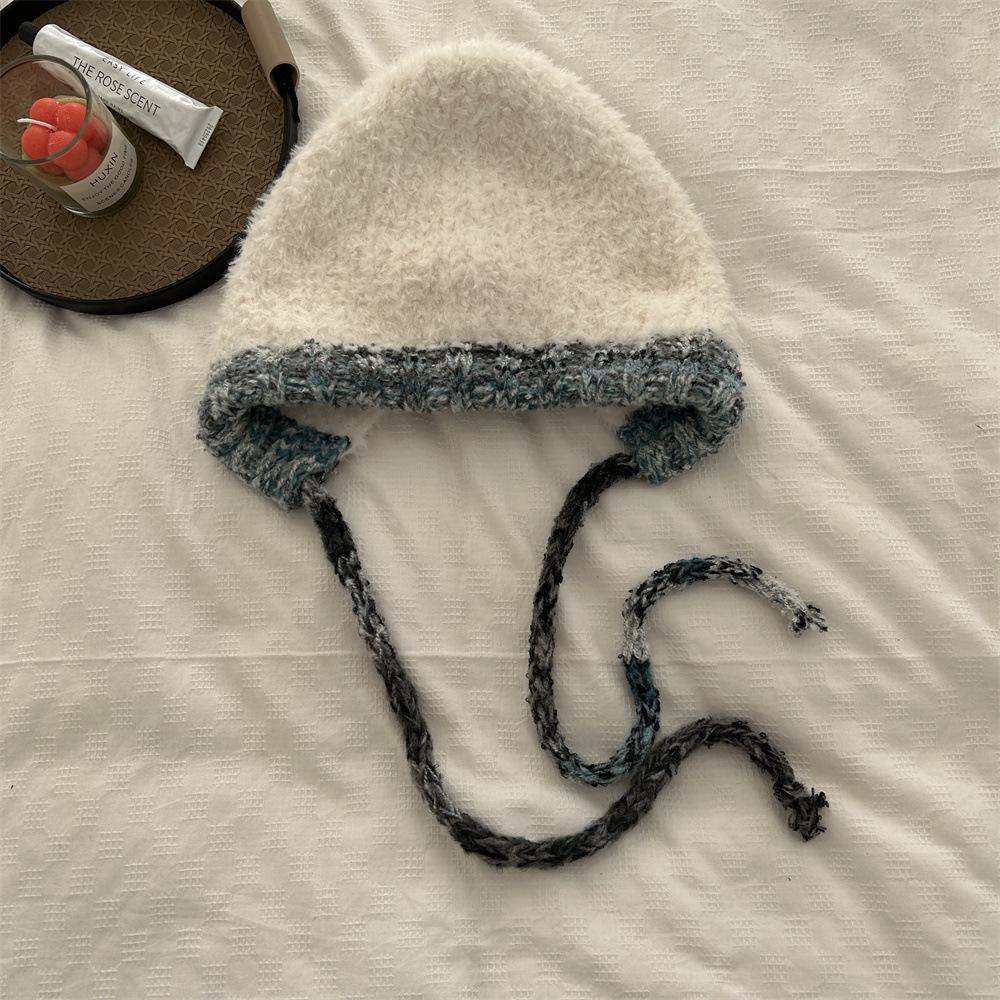 Kawanishi Women's Handmade Wool Beanie with Tassel and Ear Protection