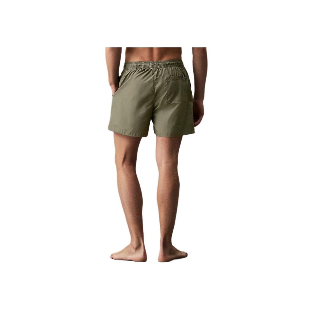 Calvin Klein Monogram Series Drawstring Pocket Hem Letter Casual Swim Shorts Men Swim Shorts Dark-Olive KM0KM01003-LDY