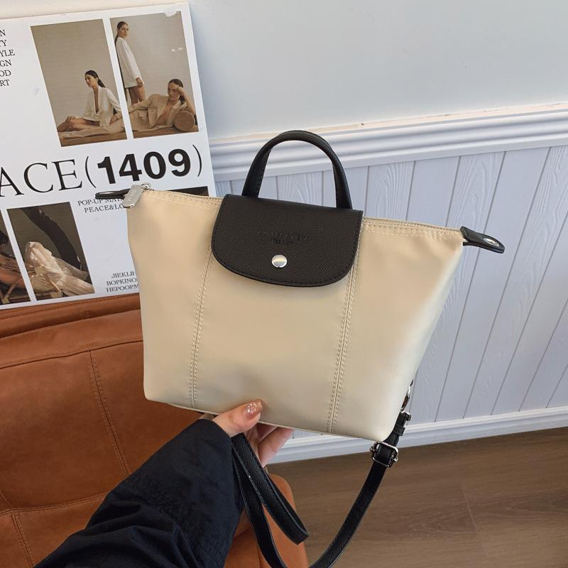 

Trendy bag women s summer new casual simple double shoulder high-end sense niche single shoulder oblique span bag бежевый