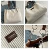 An Elegant Corduroy Handbag for Women,Featuring A Chain Shoulder Strap,Spacious Design,Perfect for Daily Commuting,with A Polyester Lining,Zip Closure