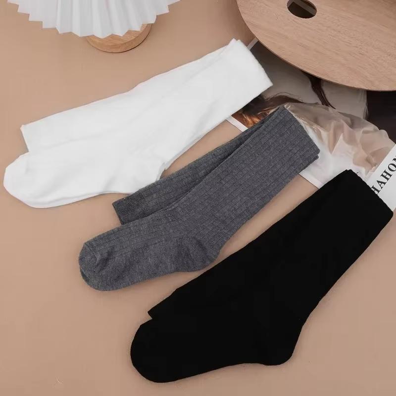 Chaussettes en laine Femme Automne/Hiver Couleur unie Cuisse haute Médias Lolita Chaussettes chaudes épaisses Noir Blanc Chaussettes longues pour femme