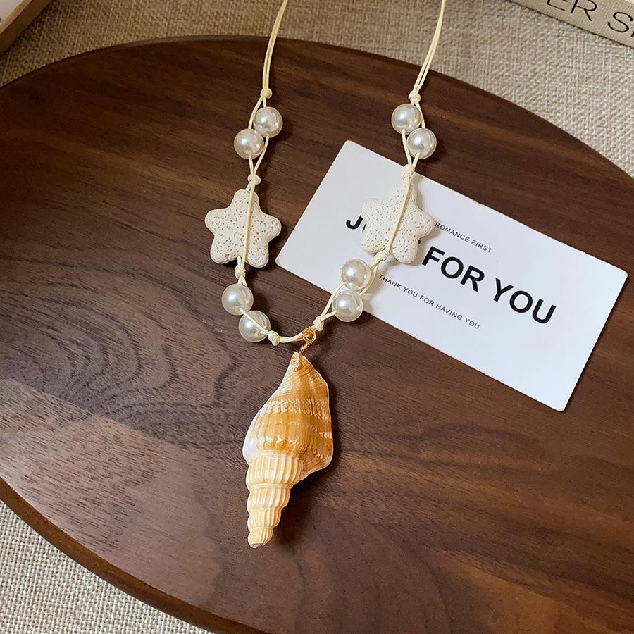 Retro Ethnic Heart Necklace: Wooden Flower Pendant Sweater Chain for Women