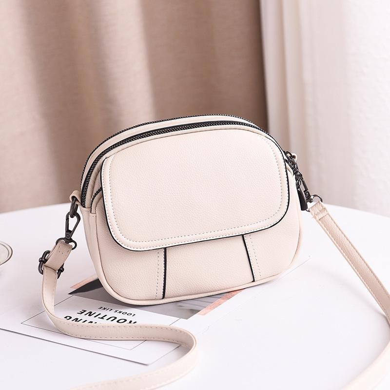 

Autumn and Winter New Trend Simple Small Round Bag Korean Version Student Mobile Phone Shoulder Crossbody Bag белый