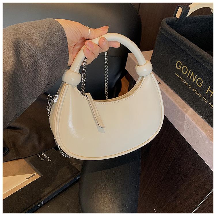 

Dumpling bag women s summer season new fashion trend simple casual shoulder bag niche design hand bag белый