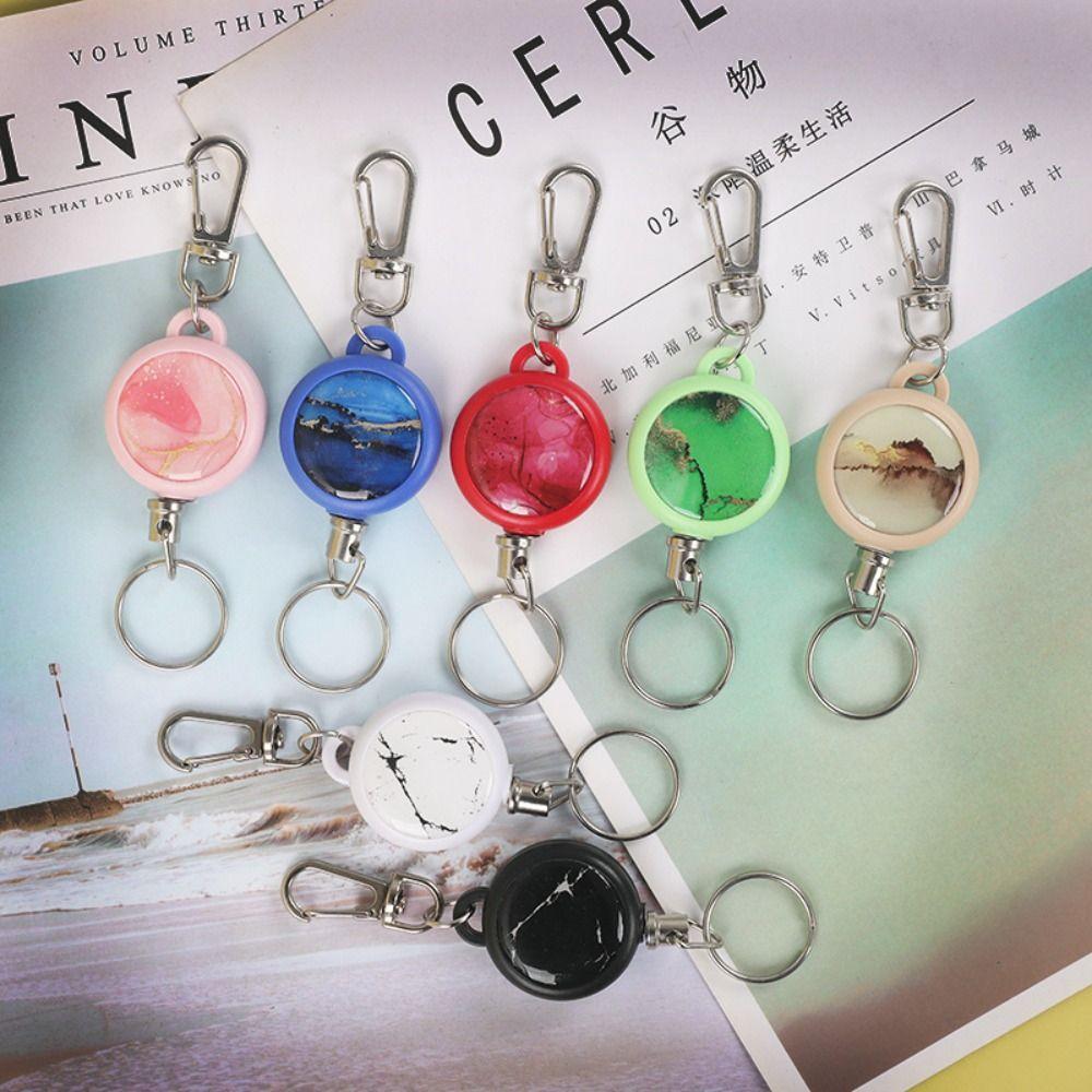 

Return Retractable Camping Telescopic Keychain 7 Colors Key Holder Outdoor Key Ring Outdoor Tool