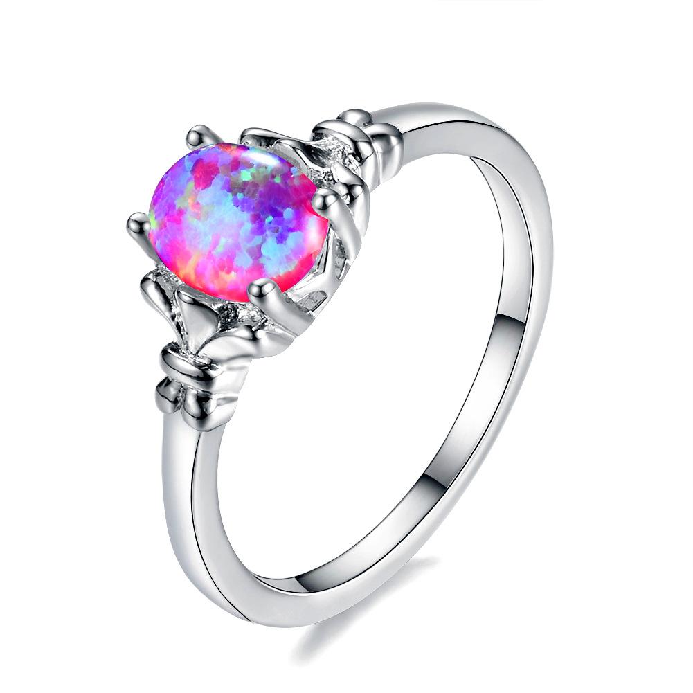 New four-pronged Opal ring, simple, stylish, and exuding a sense of understated luxury