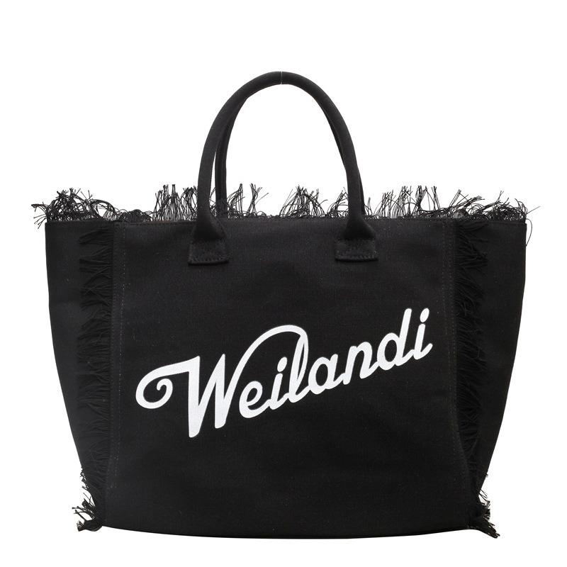 

Original tassel canvas tote bag women s new trend letter large capacity commuter shoulder bag чорний
