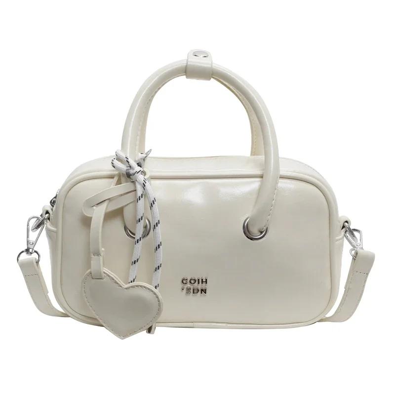 

Небольшая сумка-подушка из полиуретанового материала, стильная и универсальная, для поездок на работу, изысканная и продвинутая в европейском стиле