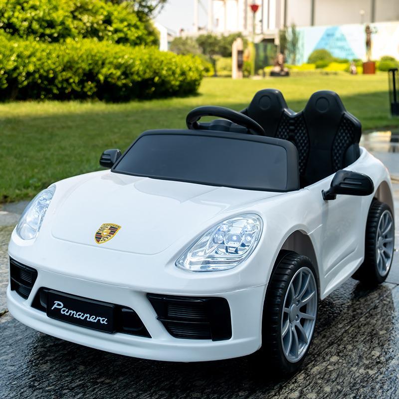 

Детский электромобиль с дистанционным управлением, фарами, музыкой и режимом коляски для мальчиков и девочек.