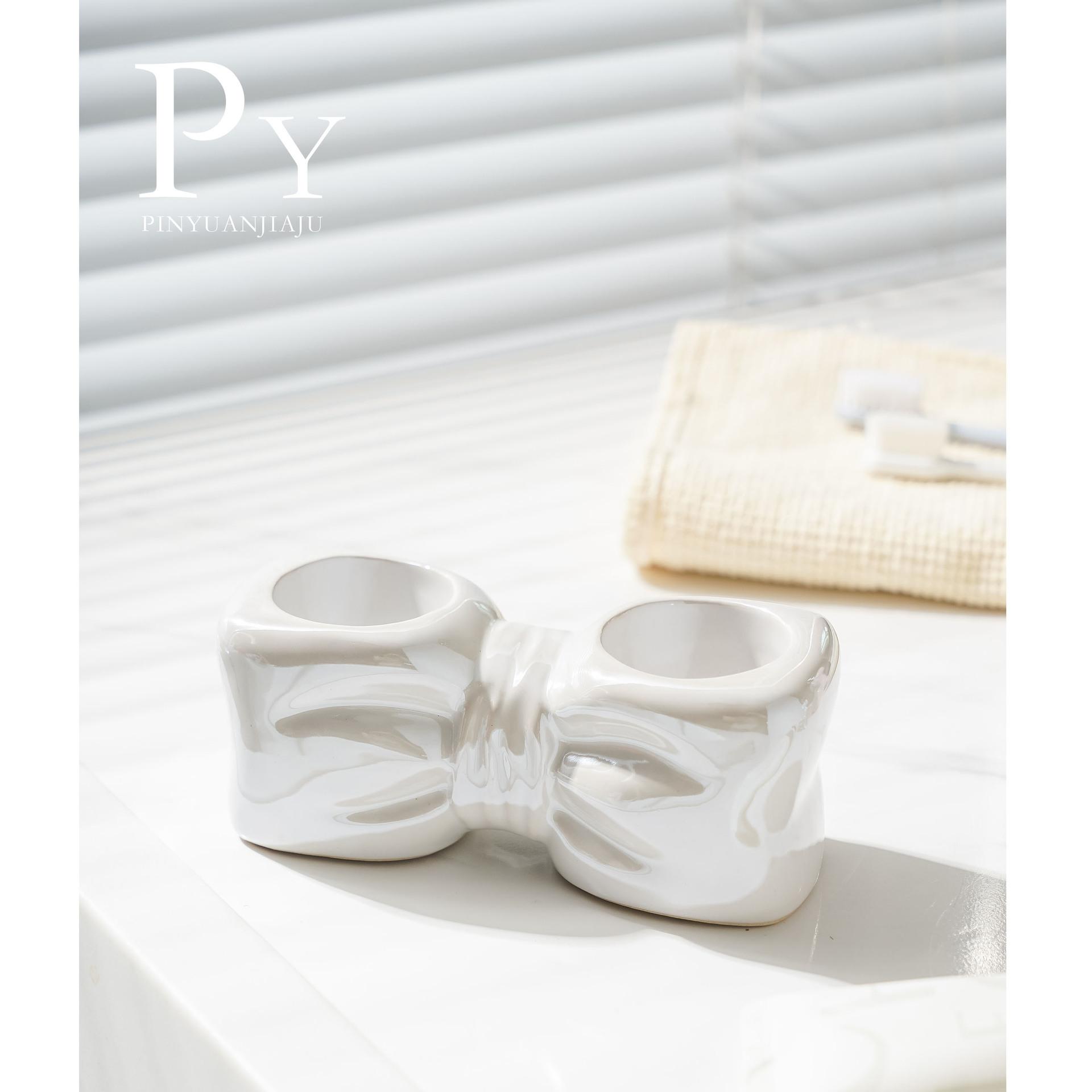 

Creative bow lotion bottle electric toothbrush toothbrush rack toothpaste shelf toilet wash basin storage base cup dispenser