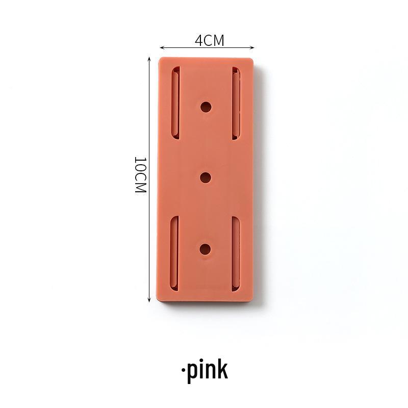 Punch-Free Socket Holder: Traceless, Detachable Wall Mount with Strong Self-Adhesive Hook for Bedroom and Study