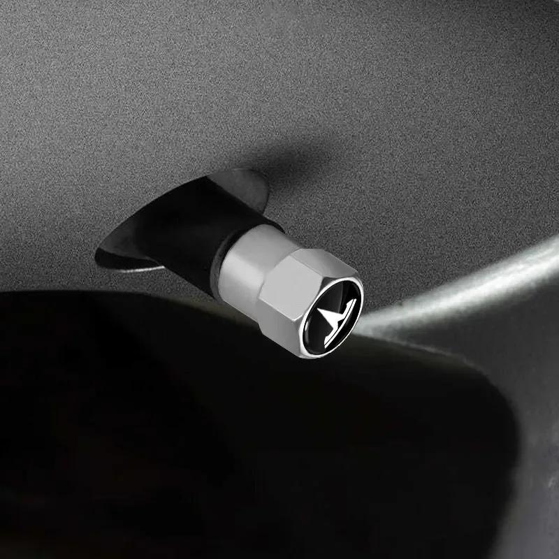 Bilklistermärke Tesla 4 st Bil däckventilhattar Metall Däckluftstammar Skydd För Tesla Model 3 Y S X Roadster Model 3 S X Y 2022 Invadera