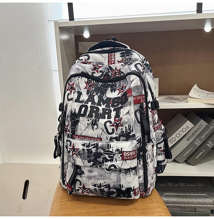 Schoolbag Trendy Cool Graffiti New Burden Reduction Schoolbag Junior High School Students Large Capacity Backpack High Value Lightweight Women's