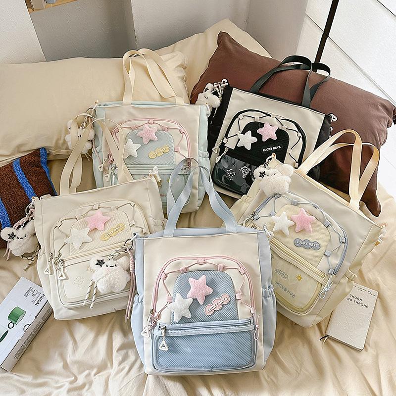 Large capacity messenger bag women's new Japanese cute student portable shoulder bag lightweight junior high school student tote bag