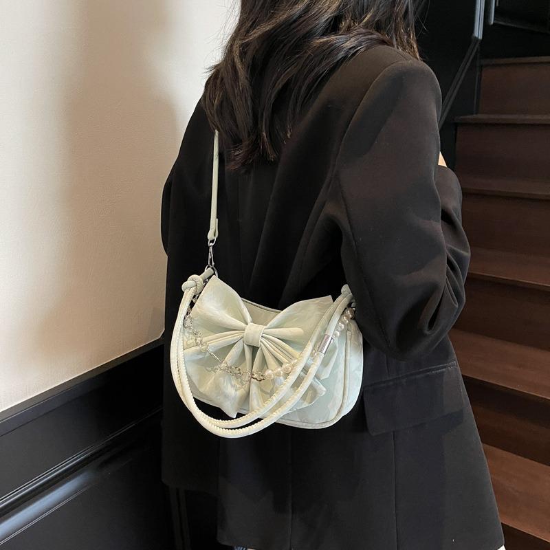 Portable high-end messenger bag women's summer new fashion versatile pleated bow chain bag