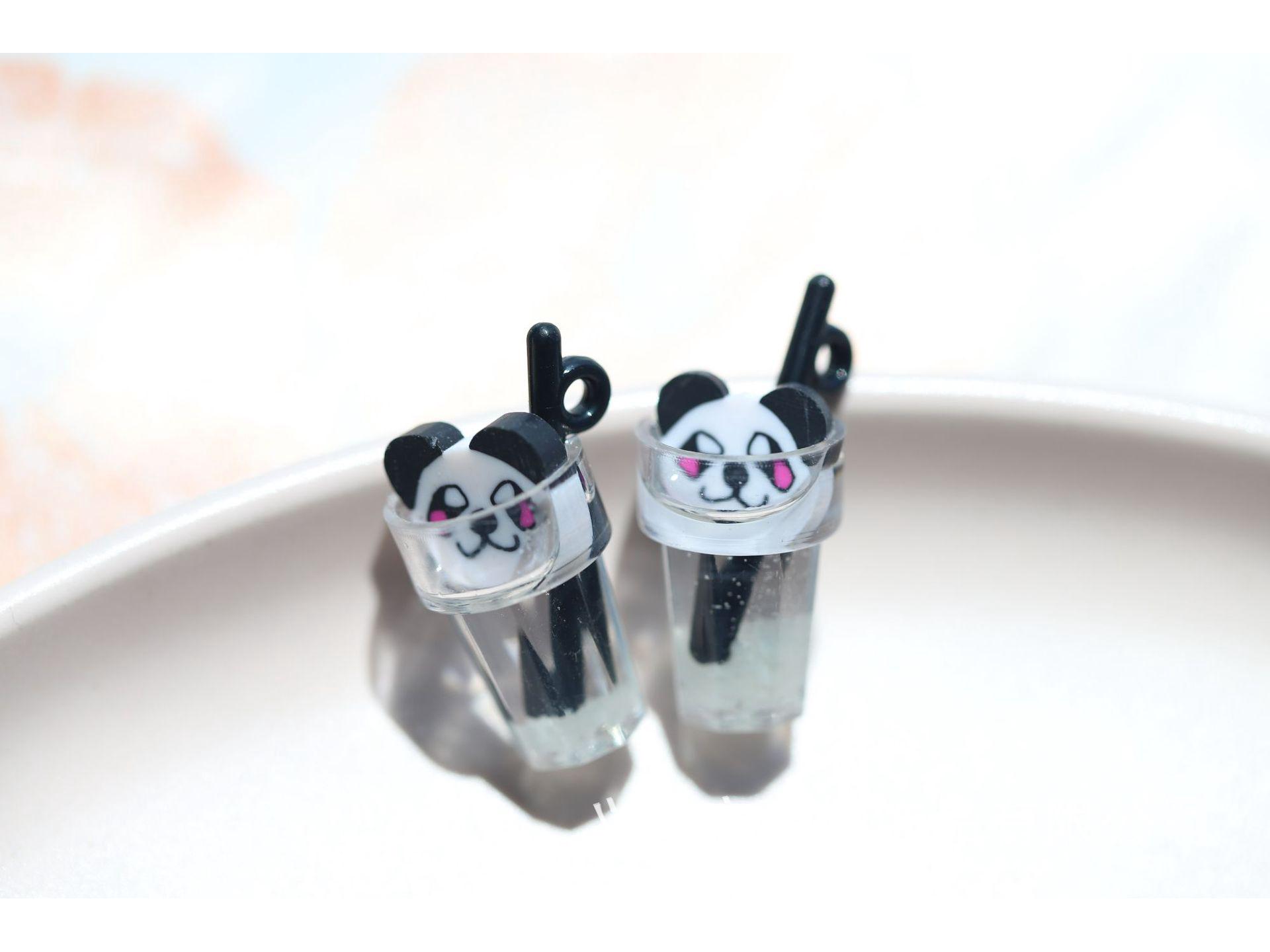 

Светящийся 3D брелок в виде бутылки с напитком в виде кусочка фрукта и серьги-подвески 1.2cm x 2.5cm