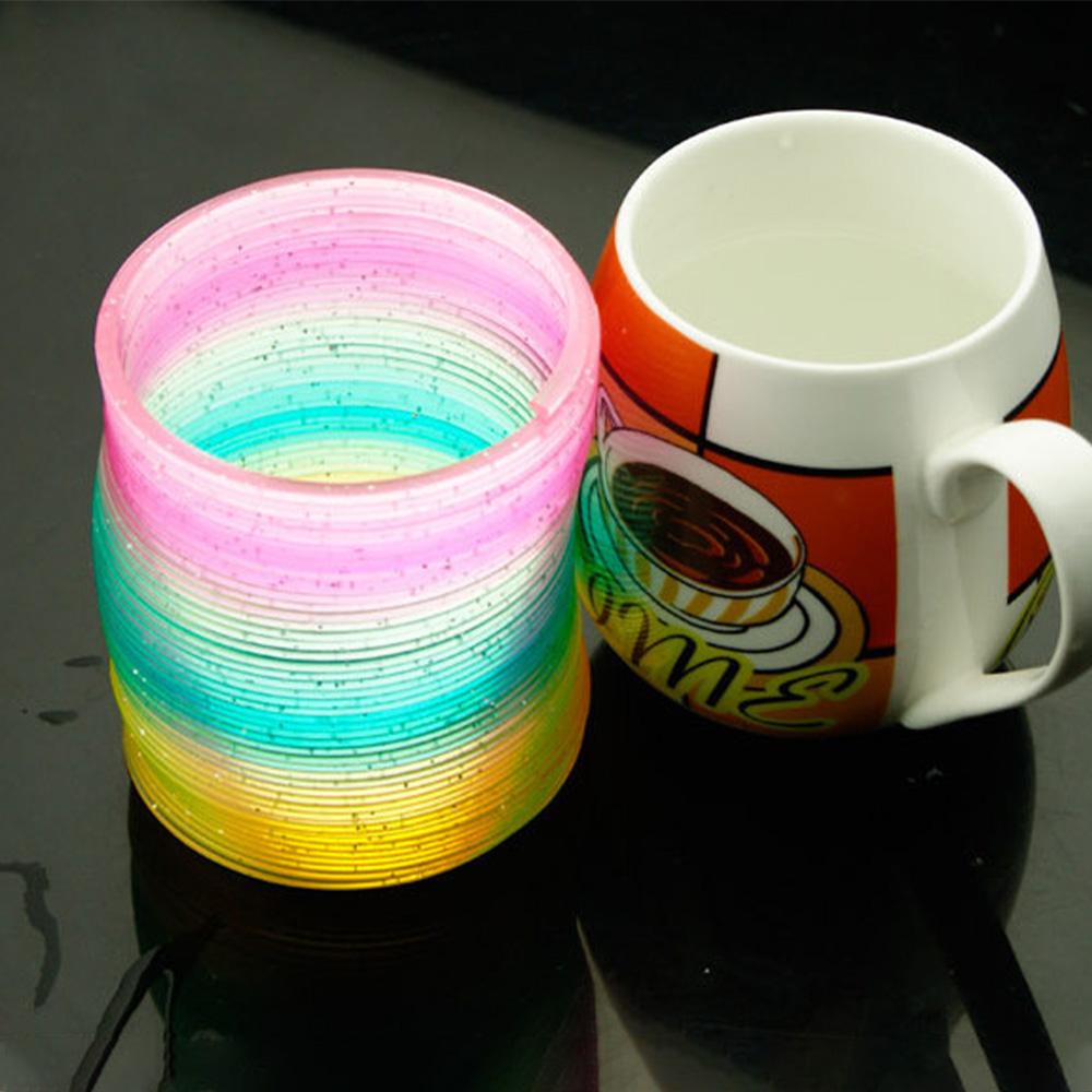 Giocattoli Magici Rimbalzanti Colorati Giochi da Tavolo Per Bambini Anello Magico Antistress Molla Gioco da Tavolo Arcobaleno Regali Creativi Divertenti per Bambini