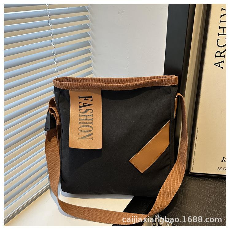 Spring Crossbody Simple Fashion Literary Niche Canvas Women's Tote Large Capacity One-shoulder Commuter Casual Bag Trend