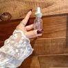 Diamond-Inlaid Frosted Glass Essential Oil Bottle with Rubber Dropper for Serums and Liquid Cosmetics.