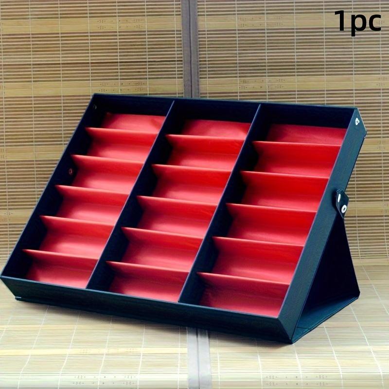 

18-compartment eyewear display case, durable plastic with clear lids. Sleek black frame for retail & home use. коричневий