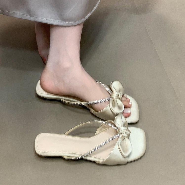 Fashion summer French retro bow open-toed slippers women's rhinestone sweet cool slippers low heel versatile one-word drag