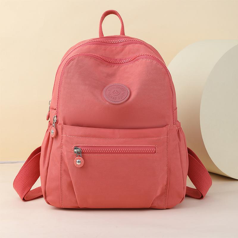 Tykket nylon oxford klut ryggsekk kvinners vanntett reiseryggsekk med stor kapasitet Lett reiseveske