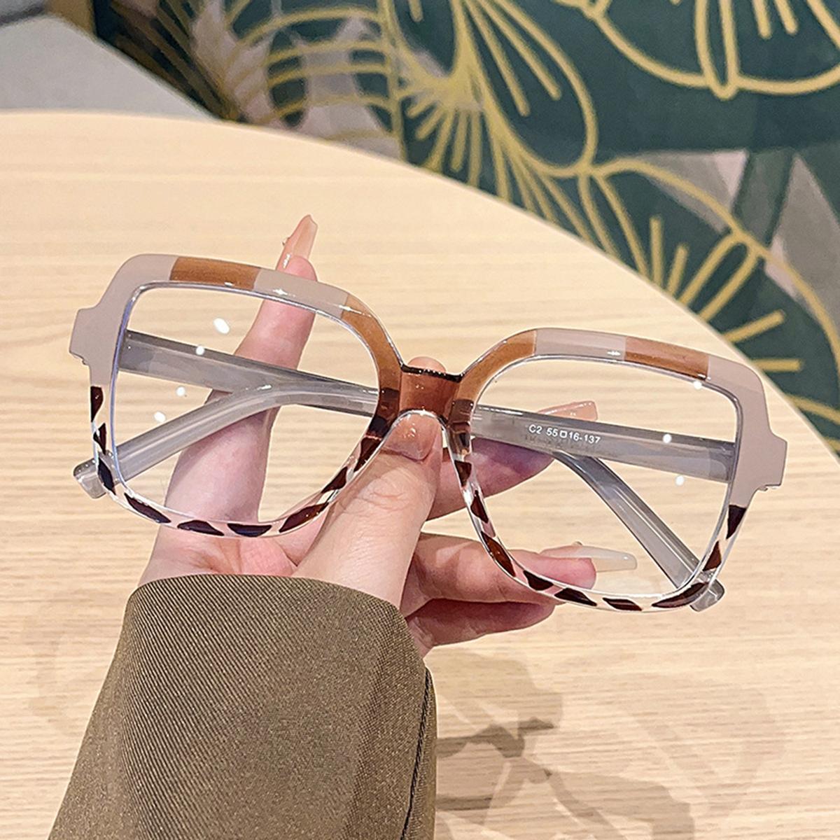 

Box Contrast Anti-blue Glasses Frame Нові європейські та американські модні подіуми Flat Mirror Trend Окуляри у великій оправі дубильна кора
