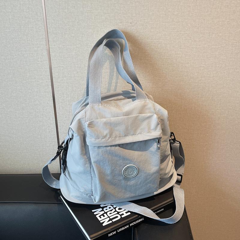 Canvas bag women's large capacity 2025 new spring and summer casual shoulder messenger bag texture class tote bag