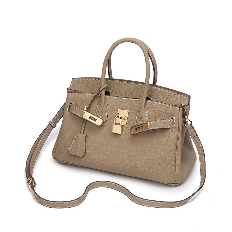 Hand sewn wax thread togo first layer cowhide horizontal platinum bag, genuine leather women s bag lock high-end casual handbag 20CM