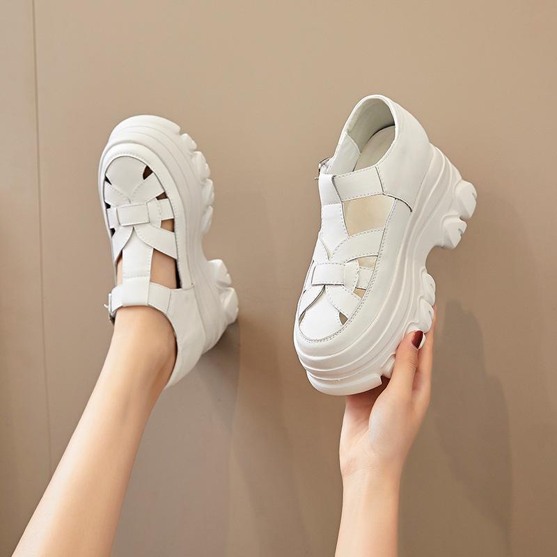 Korean version of thick-soled heightened leather bag head sandals women's 2025 summer new retro hollow muffin high-heeled Roman shoes