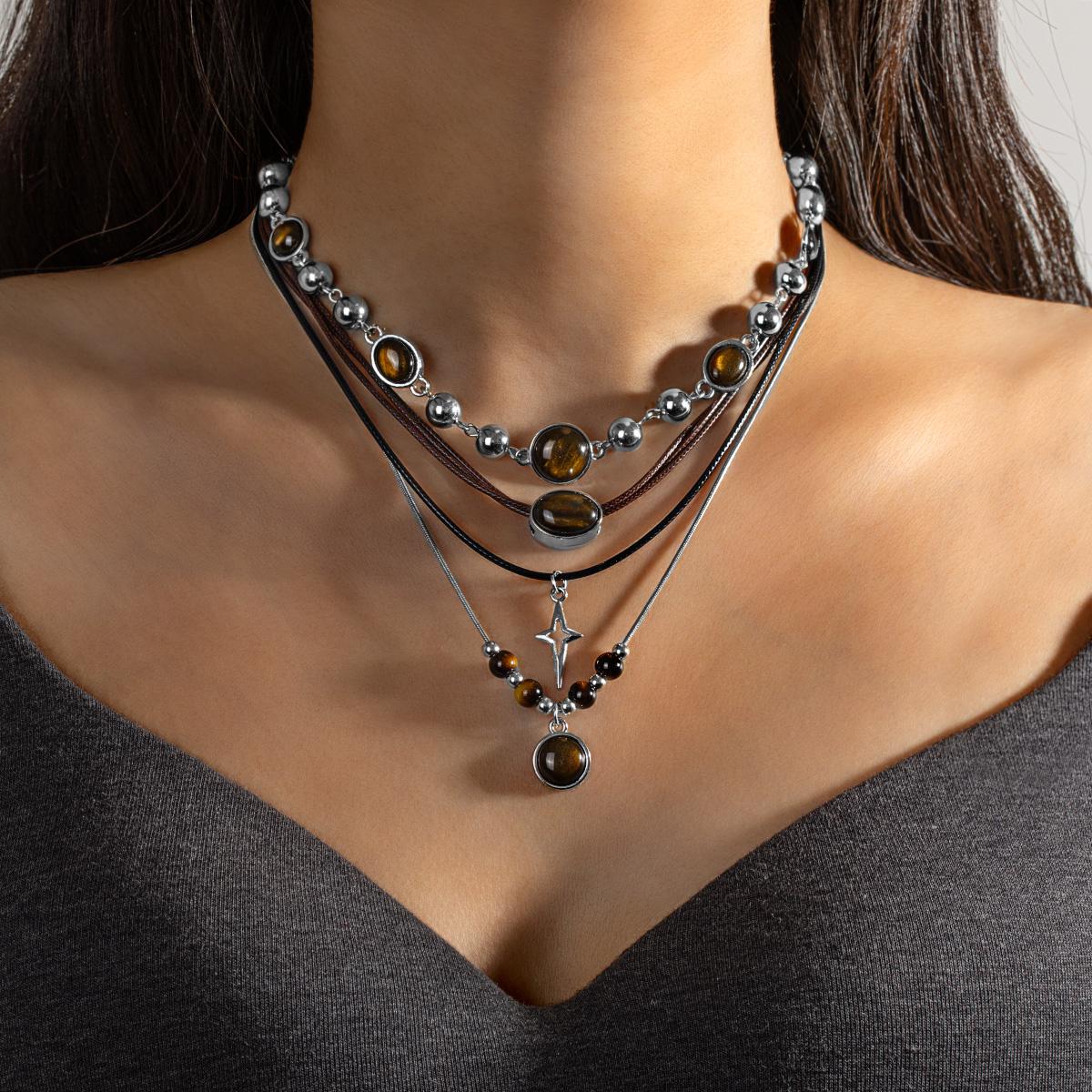 

4 pieces of Maillard colored simulated cat eye stone pendant, multiple pieces of hexagonal star leather rope bead necklace