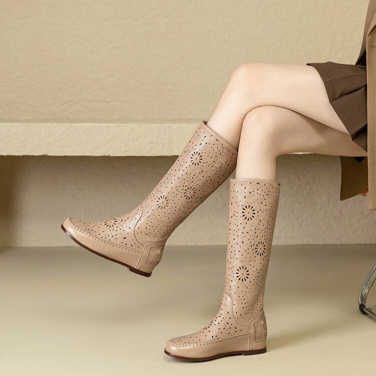 Leather breathable hollow boots women's 2025 new carved slope heel soft bottom hole cool boots women's inner height increase Martin boots
