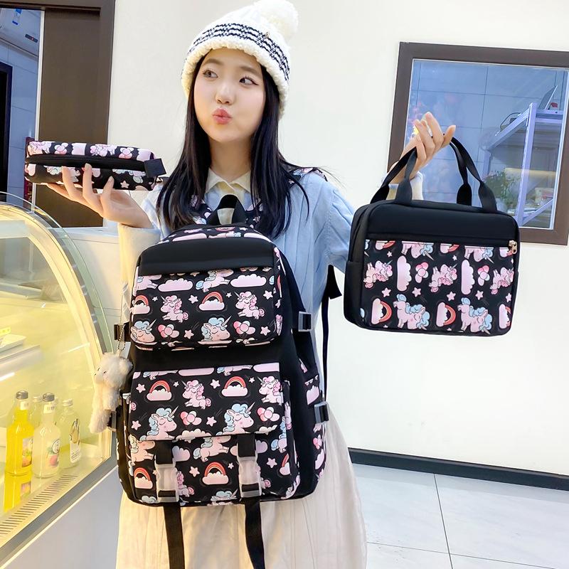 School bag new lightweight nylon backpack female cute cartoon three-piece set primary school students large-capacity school bag, fashionable