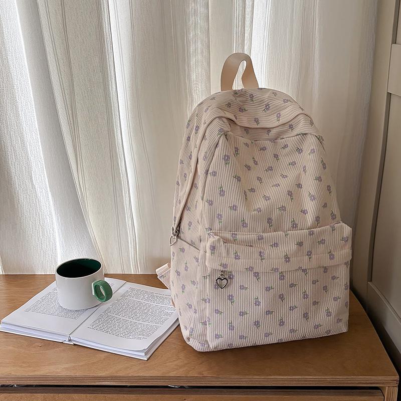 School bag female ins Japanese girls college wind small floral backpack Korean version Harajuku printed middle school student backpack female